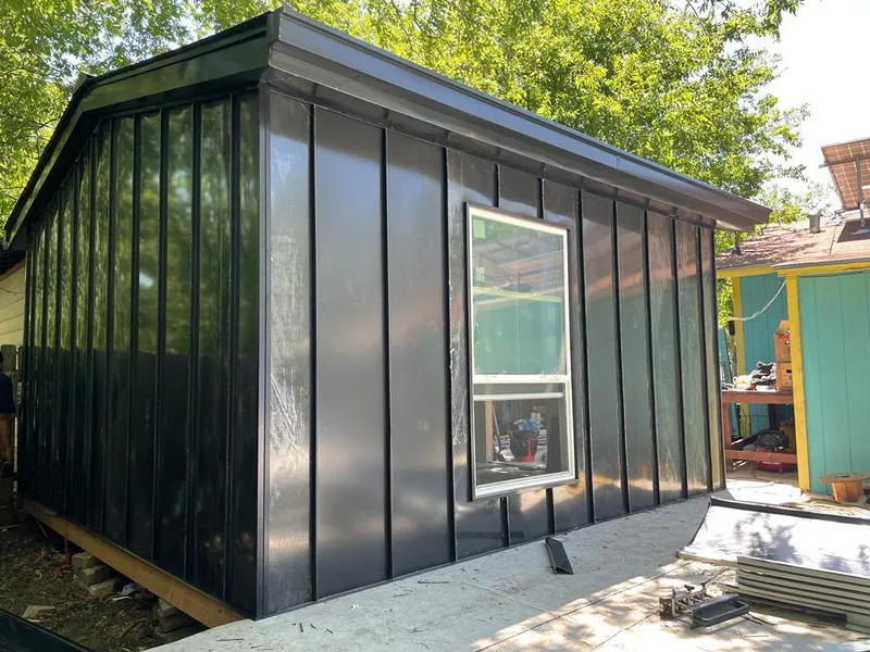 Black standing seam metal wall panels for Roof Inspection in Whitehouse