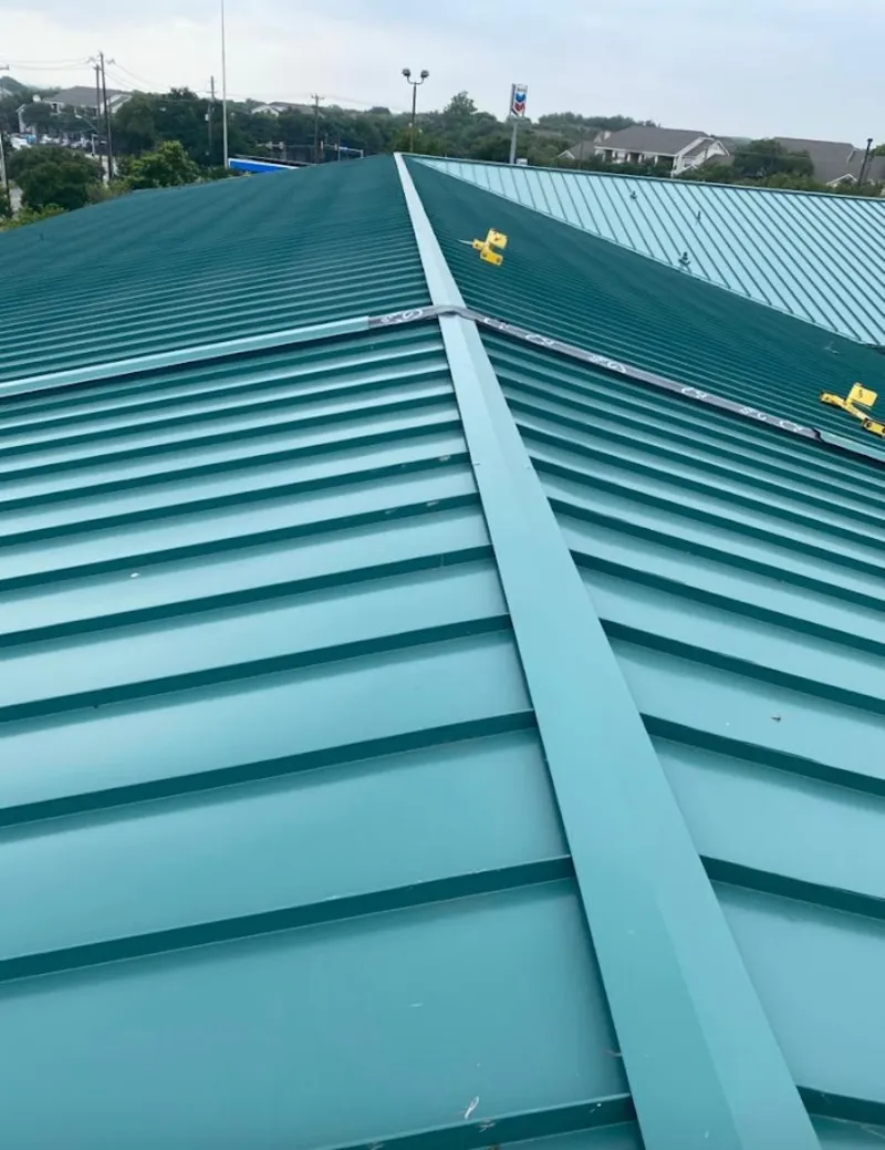 Green commercial metal roof ridge and valley for Metal Roof Repair in Whitehouse